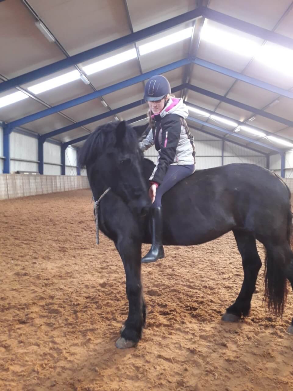 Foto van Ria op haar paard